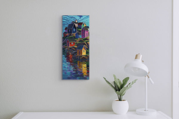 Colours of Home canvas print by Adam Young above a white desk with a lamp and plant